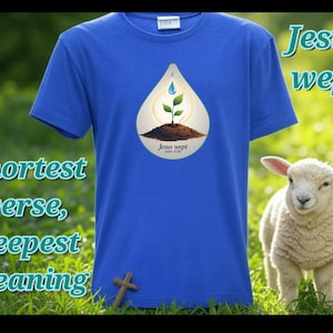 May include: A blue t-shirt with a graphic of a green plant growing from soil with a water drop above it. The text "Jesus wept" is on the graphic. The text "Shortest verse, deepest meaning" is on the left side of the image. The text "Jesus wept" is on the right side of the image.