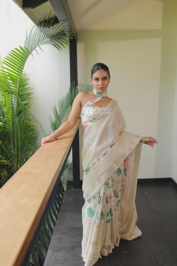 Ivory green and pink lotus print banarasi Kerala onam saree with Blouse White & Gold Zari Woven Saree | Floral Indian Wedding  Festive Saree