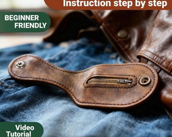 May include: A brown leather strap with a small zippered pocket and two metal snap buttons, resting on blue denim fabric. Text overlays include PDF Pattern, Instruction step by step, BEGINNER FRIENDLY, Video Tutorial, and INSTANT DOWNLOAD.