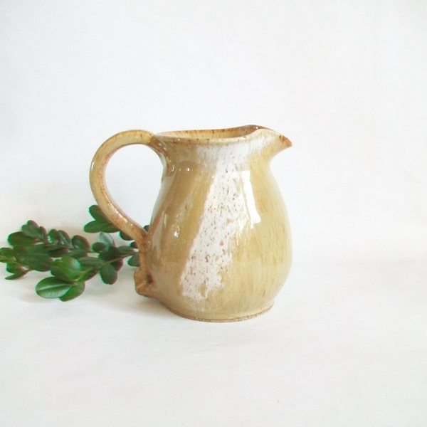 Pitcher - Wheel Thrown in Speckled Stoneware with a Cream and Caramel Glaze