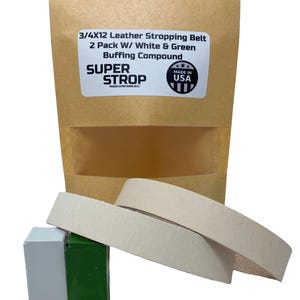 Puede incluir: Dos correas de afilado de cuero, una blanca y una verde, con un paquete de compuesto de pulido blanco y verde. El paquete está etiquetado como "3/4X12 Leather Stropping Belt 2 Pack W/ White & Green Buffing Compound" y "SUPER STROP" con una etiqueta "Made in USA".