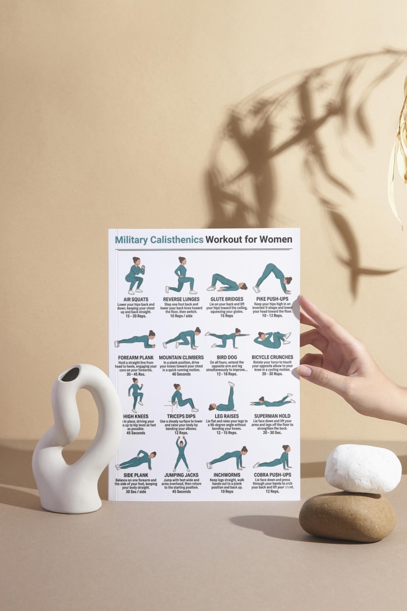 May include: A white ceramic sculpture with a curved design and a workout chart titled "Military Calisthenics Workout for Women." The chart displays various exercises with illustrations and instructions. A hand is holding the chart.
