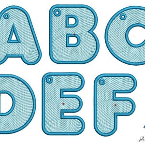 May include: Blue embroidered letters A, B, C, D, E, and F with a hole at the top of each letter. The letters are outlined in a darker blue and have a textured pattern inside.