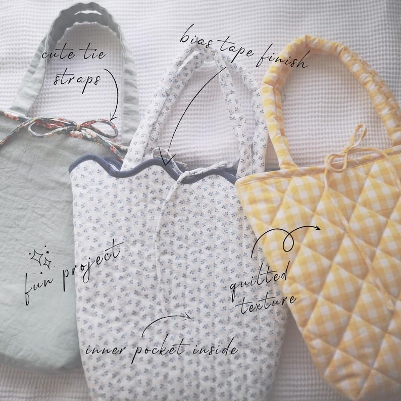 May include: Three handmade tote bags in pastel colors. One is light green with tie straps, another is white with a floral pattern, and the third is yellow with a quilted texture. The bags have bias tape finishes and inner pockets.