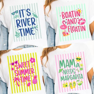 May include: Four white t-shirts with summer-themed graphics. One shirt says "It's River Time" with sunglasses and a dragonfly. Another says "Boatin' and Floatin" with a flamingo and a life preserver. The third says "Sweet Summer Time" with a pineapple. The last says "Mama Needs Margarita".
