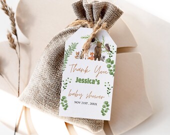 Op de afbeelding: Een wit bedankkaartje met groene bladeren en bosdieren. Het kaartje zegt "Bedankt Jessica's Baby Shower Nov 21st, 20XX".