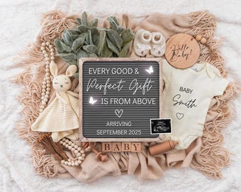 May include: A neutral gender baby announcement with a letter board that reads "Every good & perfect gift is from above, arriving September 2025". The letter board is surrounded by a white crocheted bunny, a white onesie with the text "Baby Smith", a wooden sign that reads "Hello Baby!" and other baby-themed decorations.