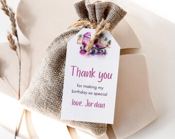 May include: A white thank you tag with a pink and purple watercolor illustration of roller skates. The tag says "Thank you for making my birthday so special love. Jordan".