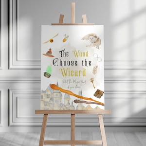 May include: A white sign with a watercolor illustration of a castle, a wand, a hat, a book, a key, a feather, a pair of glasses, an owl, and a potion. The text on the sign reads "The Wand Choose the Wizard Select the Magic Wand of your choice!"