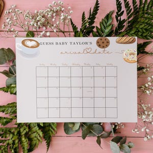 May include: A printable baby shower game with a calendar for guests to guess the baby's arrival date. The game features a light brown background with the text "Guess Baby Taylor's arrival date" in a copper color. The calendar is surrounded by illustrations of coffee, cookies, and donuts.