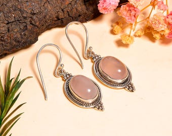 Brincos de prata de lei 925 feitos à mão com quartzo rosa.