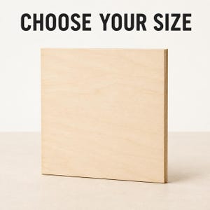 May include: A square, light-colored wooden panel with a smooth, natural grain finish. The text CHOOSE YOUR SIZE is printed in bold, black, sans-serif capital letters above the panel. The panel has visible layered edges showing its construction.