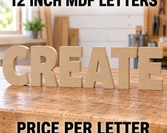 May include: Six freestanding 12 inch MDF letters spelling the word CREATE in a light brown, matte finish. The letters are arranged in a horizontal line on a wooden surface. The text 12 INCH MDF LETTERS and PRICE PER LETTER is visible.