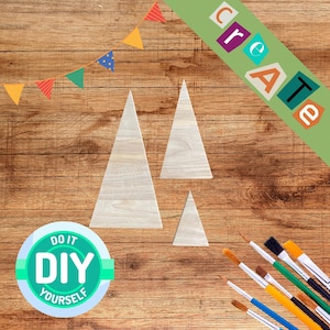 May include: A set of three wooden triangle shapes on a woodgrain background. The triangles are different sizes and are ready to be painted. The image also includes paintbrushes and a DIY sign.