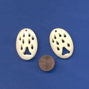 2 White Bone Wolf Pawprint Beads, Hand Carved