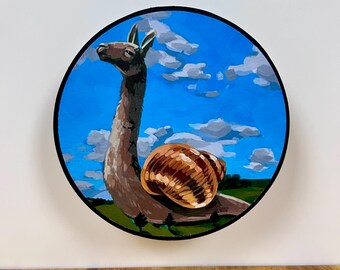 May include: A circular painting featuring a surreal creature with the head and neck of a brown llama and the shell of a snail. The creature is set against a bright blue sky with white clouds and a green landscape, all enclosed in a black border.