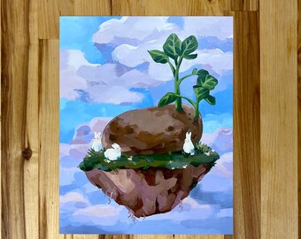 May include: A rectangular art print featuring a floating island in a blue sky with white clouds. A large brown potato sits on the grassy surface of the island, with a green plant growing from its top. Three small white rabbits sit on the grass.
