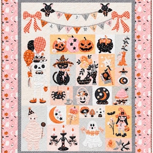 May include: A rectangular quilt featuring a pink border with small Halloween icons. The center displays a banner reading HAPPY HALLOWEEN above various patches including a skeleton, a black cat, a mummy, a ghost, pumpkins, and a candelabra.
