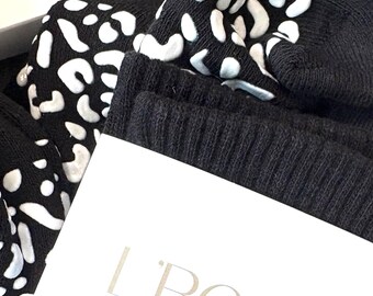 Black unisex  pilates grip socks with white animal print