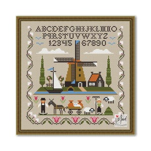 Op de afbeelding: Borduurpatroon met een Nederlandse windmolen, huizen en een boot. Het patroon bevat het alfabet, cijfers en een rand van bloemen. Het patroon is getiteld "Mood Stitching".