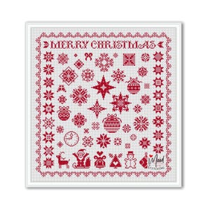 May include: A framed cross-stitch design with a white background and red Christmas-themed motifs. The design includes snowflakes, stars, ornaments, and the text "MERRY CHRISTMAS". The lower right corner features the text "Mood Stitching".