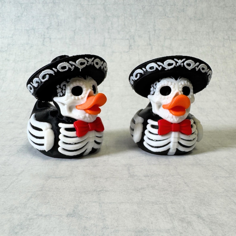 Dia Muertos Skeleton Duck Mariachi Figure Halloween Collectible Display Altar Decoration 3D Printed Design Sombrero Detail Red Bow Tie Festive Holiday Character Dashboard Ornament Spooky Season Celebration Cultural Tradition Mexican