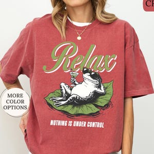 May include: A rustic wooden sign with the text "Welcome to our home" in white lettering. The sign features a distressed finish and a simple, inviting design, perfect for front door decor.