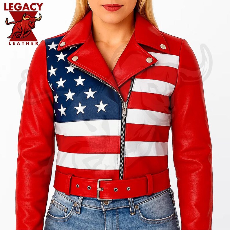 May include: A red leather jacket with a design of the American flag on the left side and back. The jacket has a zipper closure, a belt, and a collar. The sleeves and the rest of the jacket are red. The Legacy Leather logo is in the upper left corner.