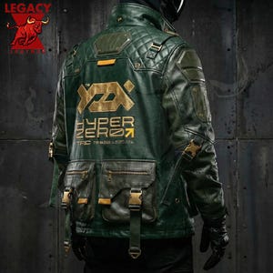 May include: Dark green leather jacket with gold detailing, including the text "HYPER ZERO" on the back. The jacket has multiple pockets, quilted shoulder panels, and gold-coloured buckles. The Legacy Leather logo is visible.