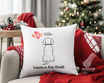 May include: White square throw pillow with a black outline drawing of a dog facing away. The pillow has the name "Milo" above the dog and the text "Forever in Our Hearts" below. Watercolor hearts are above the dog.