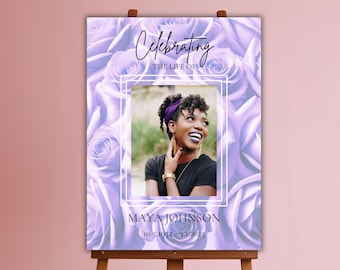 May include: A purple floral memorial poster with a photo of a woman in a black shirt and a purple headband. The text reads "Celebrating the life of Maya Johnson 10.5.1952 - 3.1.2025".