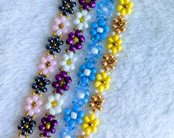 Beaded daisy bracelet set with matching earrings