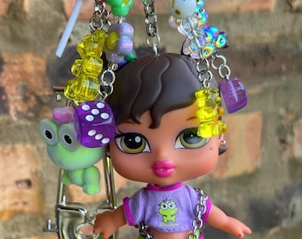 Bratz Babyz Runwayz Sasha – Muñeca Fashion Coleccionable Con Outfit, Collar Llavero Y Accesorio Teléfono – Ideal Para Niños +6 Años