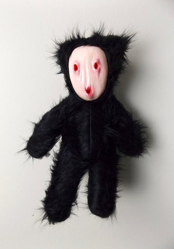 creepy bear doll