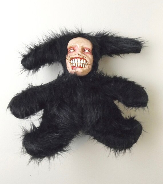 creepy teeth doll