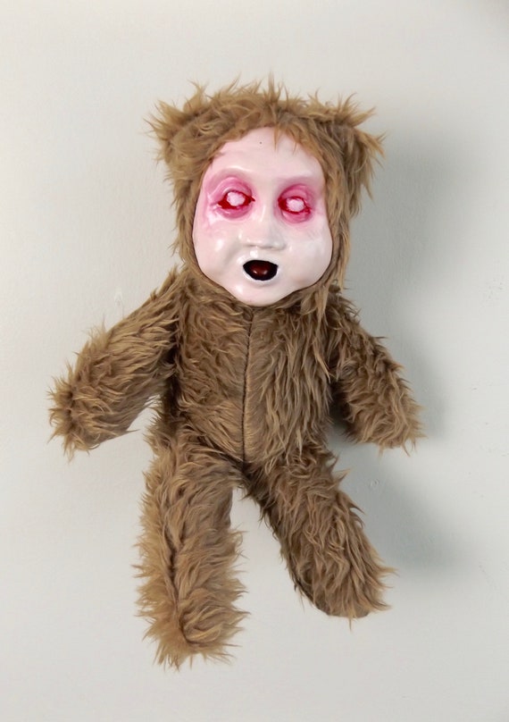 creepy bear doll