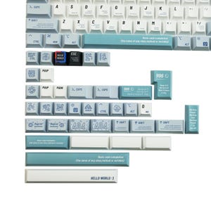 May include: A set of custom mechanical keyboard keycaps in a light blue and white color scheme. The keycaps feature various icons, text, and the phrase "HELLO WORLD :)". The keycaps are designed for a keyboard.