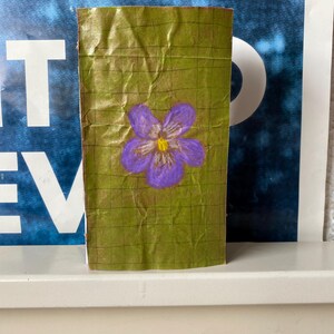 Quaderno con fiori viola