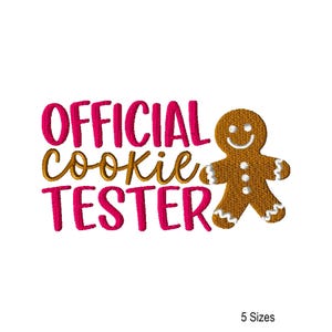 May include: A gingerbread man with a smiling face and white icing details next to the text "OFFICIAL COOKIE TESTER" in pink and gold lettering. The image is on a white background.