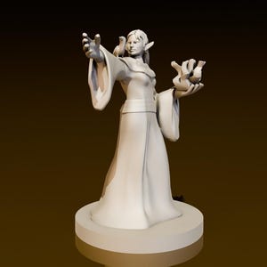 May include: White figurine of a woman with pointed ears, wearing a long robe and holding two small birds in her hands.