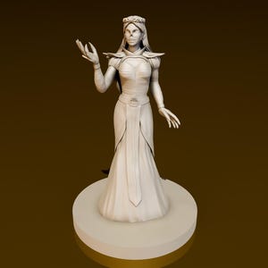 May include: A white figurine of a woman wearing a crown and a long flowing gown. She is standing on a round base.