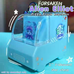 May include: A light blue Alien Elliot Pizza Truck keychain. The keychain features a cartoon alien character inside a truck with a clear top. The text "FORSAKEN Alien Elliot Pizza Truck keychain" is visible. It has a 2-inch iridescent star clasp.