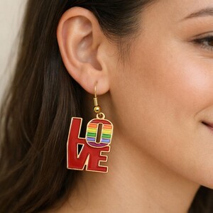 May include: A handmade, wooden serving tray with a natural finish. The tray features a rectangular shape with rounded corners and raised edges. It is designed with two handles for easy carrying. The tray measures approximately 18 inches long and 12 inches wide.