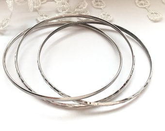 Three sterling silver bangles, vintage hammered 3 skinny bangles, hand forged bangle, textured bangle, stacking bracelets, connected bangles