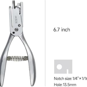 May include: Silver metal hole punch with a spring mechanism and a 1/4 inch by 1/16 inch notch. The hole punch is 6.7 inches long and creates a 13.5 mm hole.