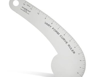 May include: A white plastic curve ruler with a 12-inch scale and the text "VARY FORM CURVE RULER".