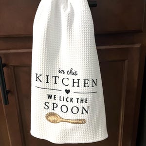 Funny Kitchen Towel: In This Kitchen We Lick the Spoon - Waffle Weave Microfiber