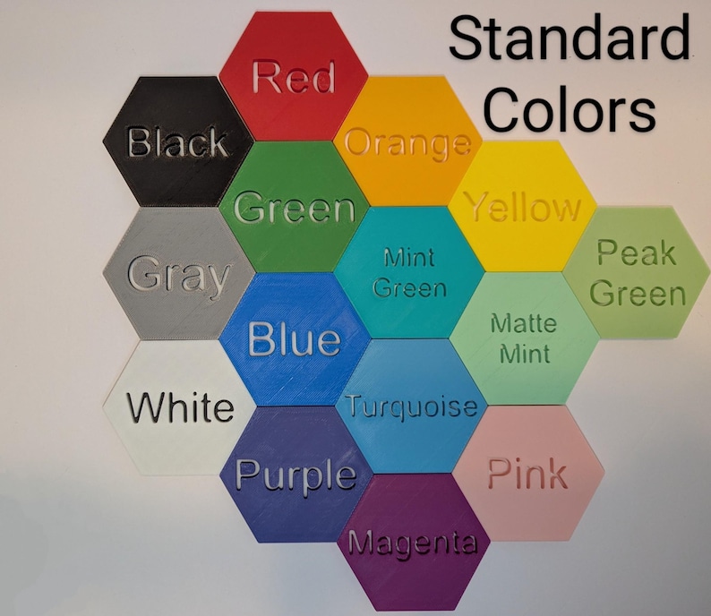 May include: A collection of hexagon-shaped color swatches in various shades, including red, orange, yellow, green, blue, and purple. The text "Standard Colors" is displayed above the swatches, with each swatch labeled with its respective color name.