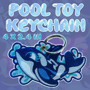 Broderad späckhuggare poolleksak nyckelring