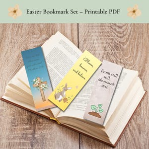 May include: Set of three printable Easter bookmarks featuring a cross with flowers, a bunny with a basket, and a sprout growing from the soil. The bookmarks include the text "Just as he said, Matthew 25:6", "Bloom, bounce, and believe", and "From still soil, the miracle stirs."